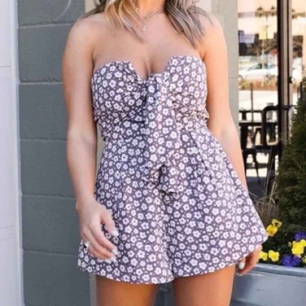 Purple Romper with White Flowers